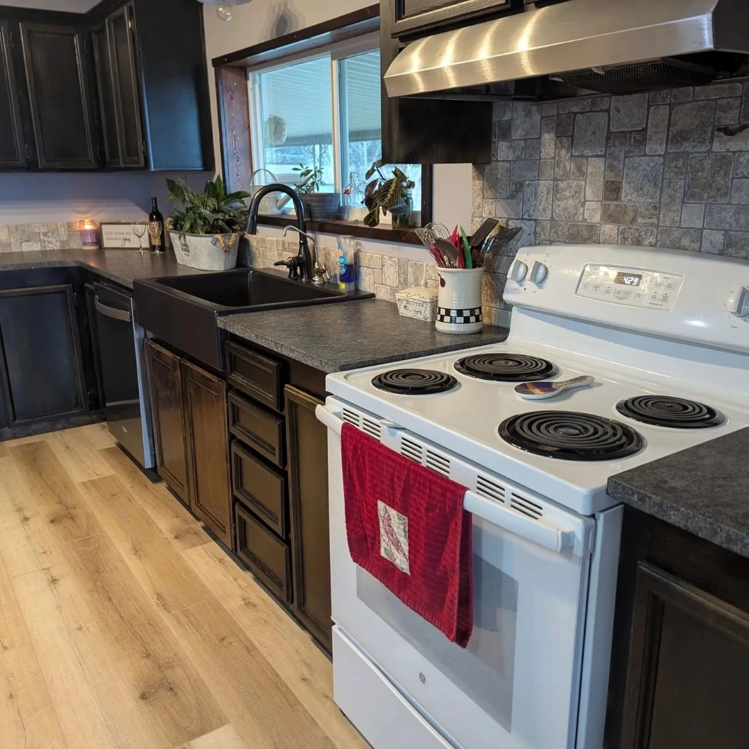 Completed Kitchen Makeover with Farmhouse Sink and Stone Backsplash Completed Kitchen Makeover with Farmhouse Sink and Stone Backsplash